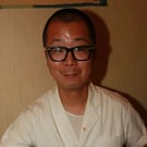 園佳典